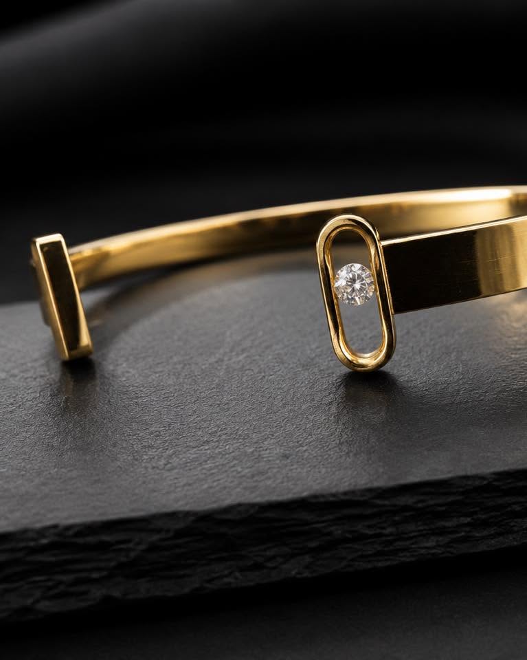 Gold cuff bracelet with diamond detail