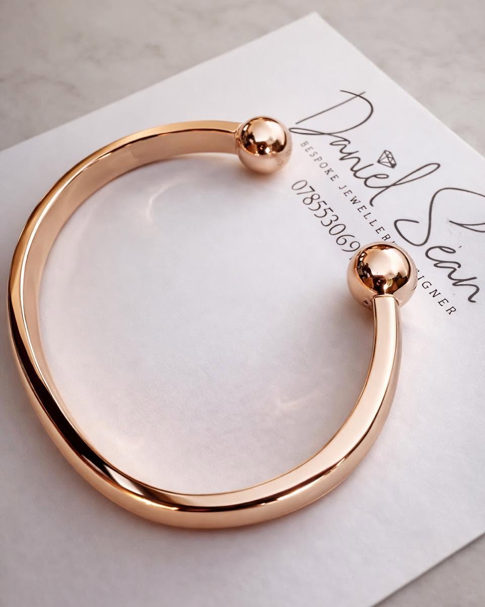 Rose gold torque bangle